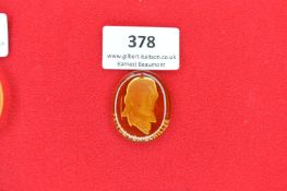 Amber glass pendant, oval, with bust portrait of Friedrich von Schiller, name engraved around