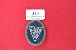 RAD Sports Badge – Oval cloth badge with embroidered triple RAD symbol, black field, RZM marked
