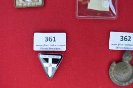 NS Frauenschaft Enamel Membership Badge – A triangular enamel badge, black and white quarters with