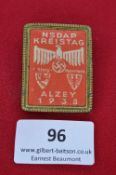 1938 NSDAP Kreistag Alzey badge, red rectangular type with eagle/swastika and town crests.