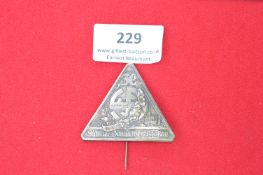 Large triangular white-metal badge commemorating the Männer Sängertreff Krakau 1936, with oakleaf
