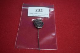 Silvered shield-shaped stickpin inscribed Ev. Arb. Ver. Gmünd with crossed hammers and flower