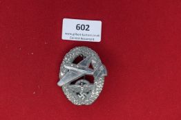 Luftwaffe Glider Pilot’s Badge – An oval badge with oak-leaf wreath and central soaring glider. A