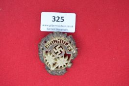 Antler Badge – Hand-carved antler piece with edelweiss flowers, central swastika and wording “Heil