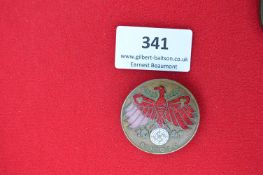 Pressed Metal Shooting Award Badge – A large circular badge depicting an eagle with spread wings