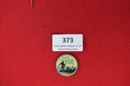 VDA Fundraising Tin Badge – A circular celluloid tin badge in blue and yellow with black