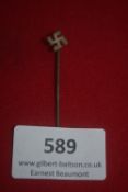 A simple cut-out swastika design in metal, mounted on a plain pin. Likely early NSDAP or sympathiser