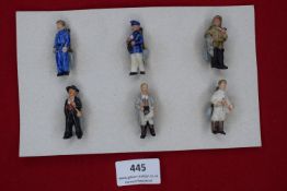 A German WWII WHW set of miniature porcelain figures, occupational types including postman,