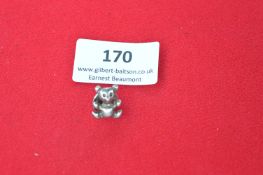 Small silver-tone novelty badge – bear design.