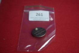 Circular Silvered Metal Badge with Fasces Design – A circular silvered pressed metal badge bearing