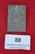 A German Third Reich Day Badge, rectangular struck metal issue for the 1st Reichsbauerntag (Farmers’