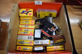 Box of Assorted NGK Spark Plugs, Ignition Parts, Condensers, and Spark Plug Resistor Covers