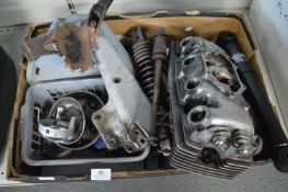 Various Motorcycle Parts Including Four Cylinder Head, Shock Absorbers, etc.