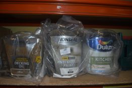 *1x 2.5L of Decking Oil Dark Oak, 1x 2.5L of Anti Mould Paint, and 1x 2.5L of Kitchen Grease & Stain