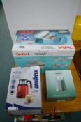 Tefal Steam Iron, Lavazza Cafetier, and Joseph Salt & Pepper Mill