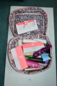 Toiletry Bag Containing Toiletries, Shampoo, etc.