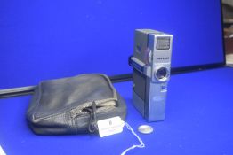 Nikkorex-8F 8mm Cine Camera with Fixed Nikkor 10mm F/1.8 Lens, Finished in Grey & Chrome. Includes