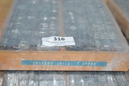 Univers Italic 10–12 pt Uppercase Metal Type