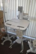 *Ergotron four wheeled medical trolley appliance s