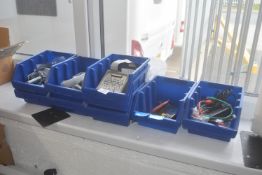 *Nine boxes containing RS232 sockets, plugs and te