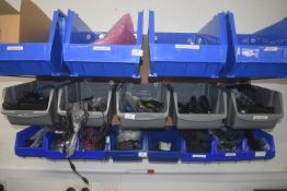 *Five grey plastic storage bins containing assort