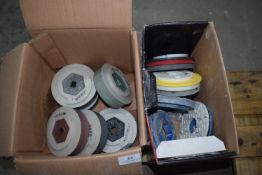 *two small boxes of polishing pads