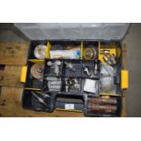 *Storage compartment containing various tile cutti