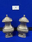A pair of silver plated salt & pepper shakers
