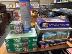 Bundle of ~7 & a Tin containing various jigsaw puzzles