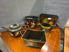 A selection of fruit & floral decorative pieces including, watering can, flowerpot, teapot etc
