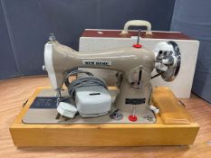 Vintage New Home sewing machine in case