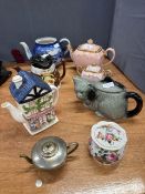 Collection of teapots and pottery