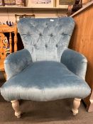 Teal velvet button backed armchair