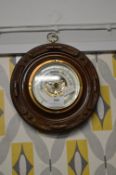 Victorian Small Circular Barometer with Carved Frame, and Brass & Enamel Face