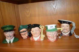 Five small character jugs including Beswick