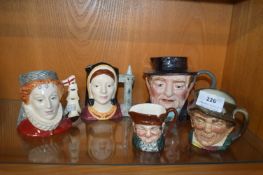 Five small character jugs including Winston Church