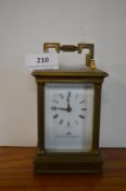 Brass carriage clock with enamelled face London ma