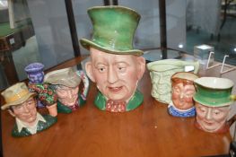 Assorted characted jugs including Beswick