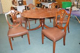 Period circular dining table on tripod base with s