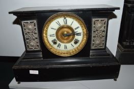 Victorian black slate mantel clock with enamelled