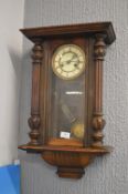 Victorian mahogany wall clock with enamelled brass