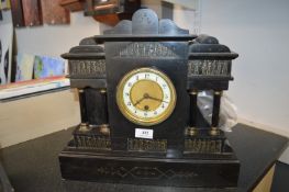 Victorian black slate mantel clock in the form of