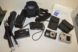 Assorted Cameras and Accessories by Nikon, Sony, and Olympus