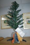 1950’s Woolworths 3ft Christmas Tree, and a Paper Bell Decoration