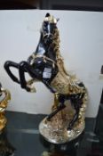 Large Gilded Pottery Prancing Horse Figure
