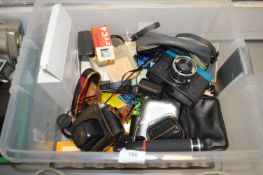 Assorted Cameras and Accessories