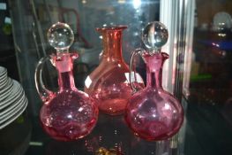 Cranberry Glass Vases and Two Jugs