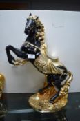 Large Gilded Pottery Prancing Horse Figure