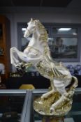 Large Gilded Pottery Prancing Horse Figure