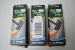 Three Zofore wrist support braces l/XL left